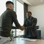two men shaking hands