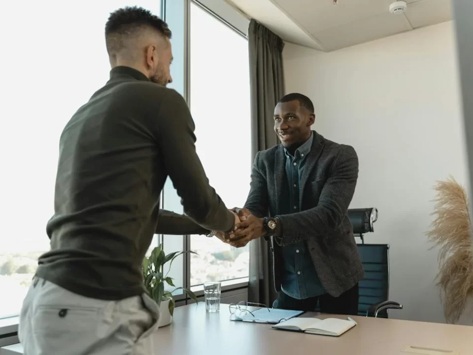 two men shaking hands